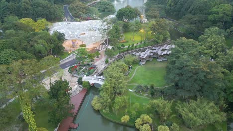 Drone-overview-shot-of-Perdana-Botanical-Garden,-Kuala-Lumpur,-Asia