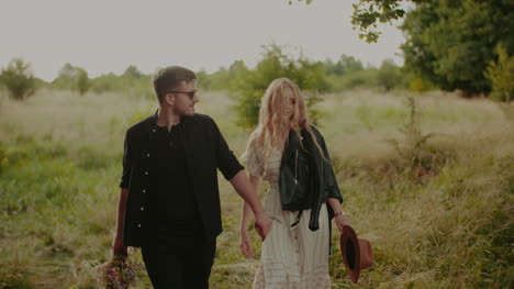 attractive carefree young couple walking and smiling on holiday 1