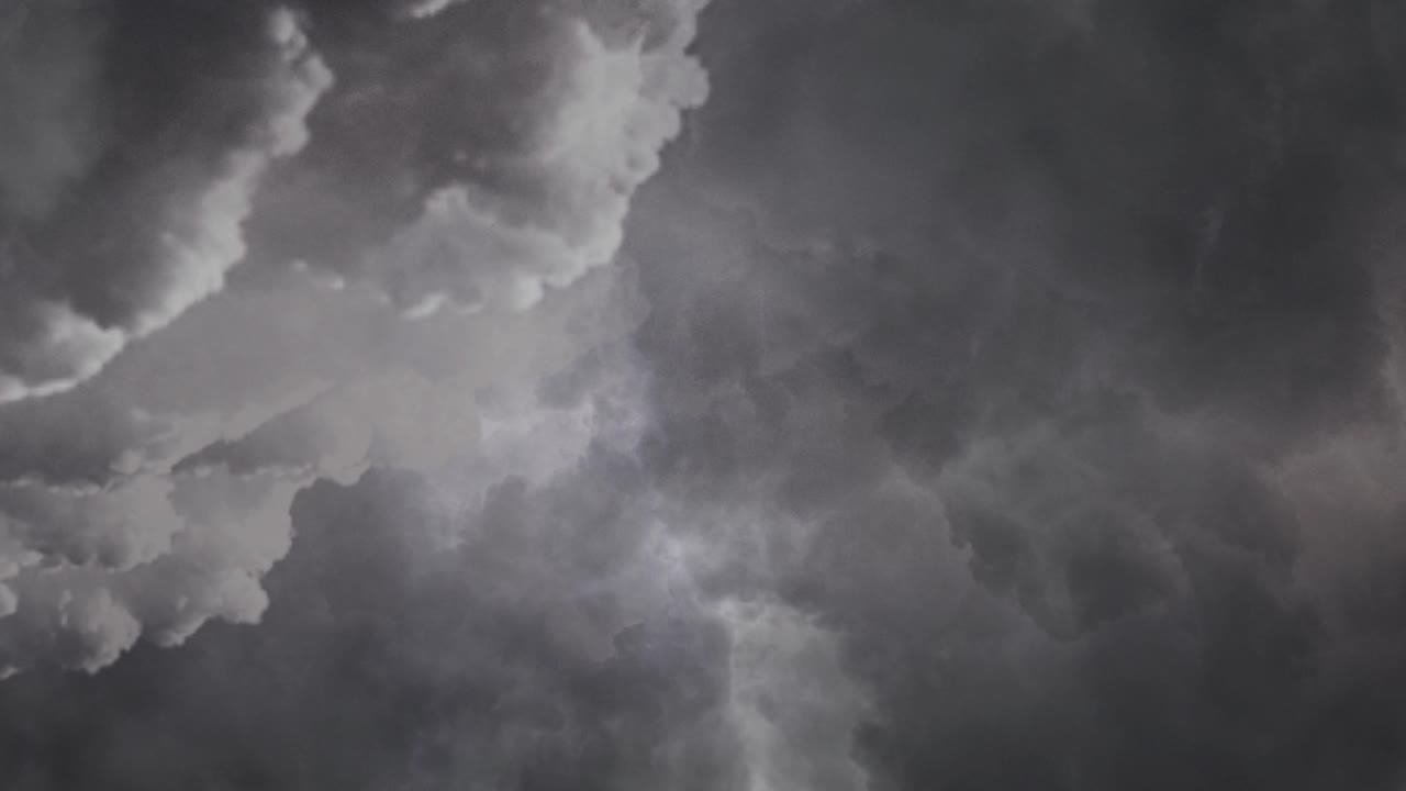 POV thunderstorm with a thunderstorm striking the clouds moving forward