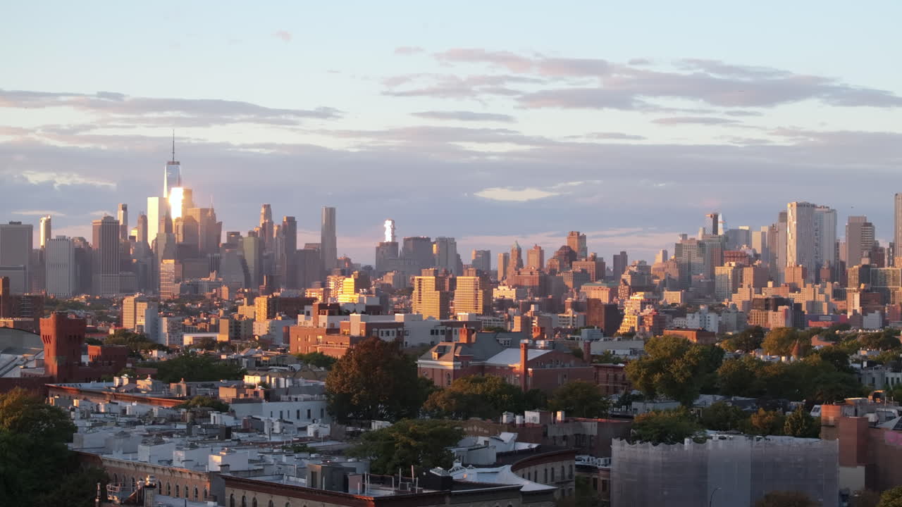 Drone footage of New York City at sunset. Shot in Brooklyn looking towards Midtown Manhattan.