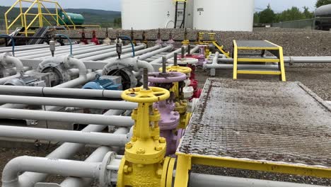 exploration shot of the various fuel pipes leading to the large storage containers