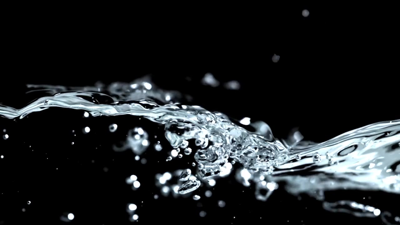 Clear Water Splashing and Bubbling on a Black Background