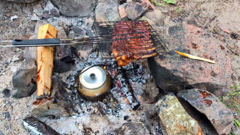 Beef-steak-on-the-grill-with-smoke-and-flames