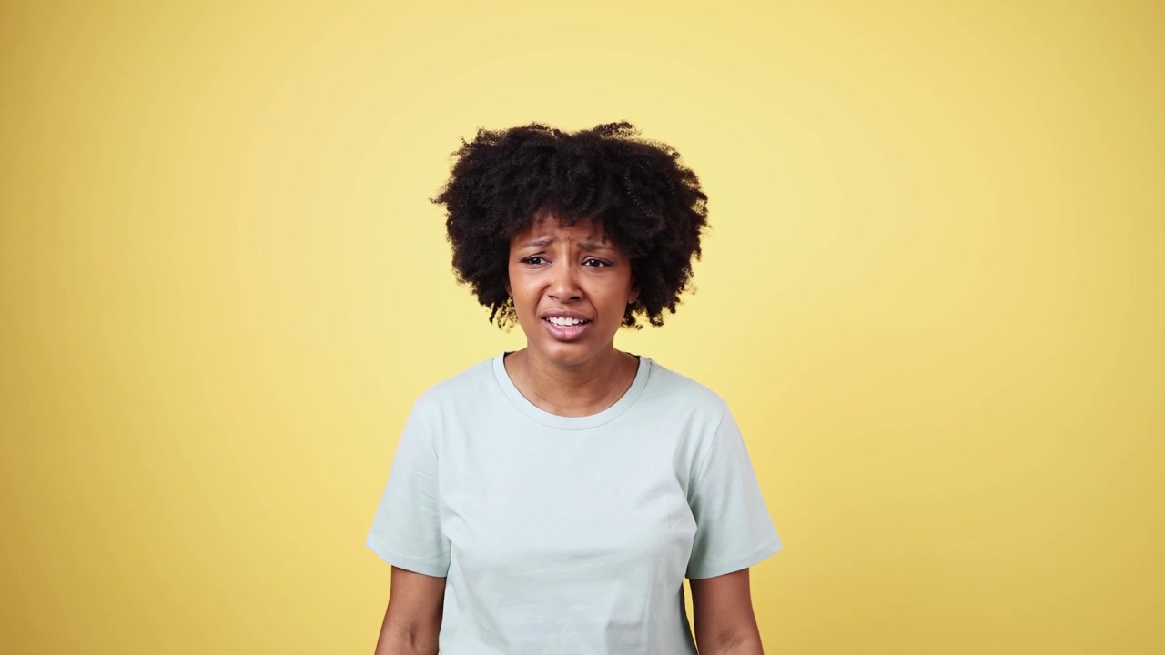 African American Woman Expressing Confusion and Uncertainty