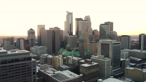 drone rising over downtown minneapolis in winter