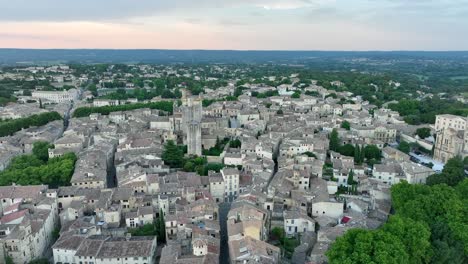 uzès medieval town in south of france - aerial orbit at dusk