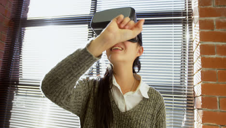 female executive using virtual reality headset 4k