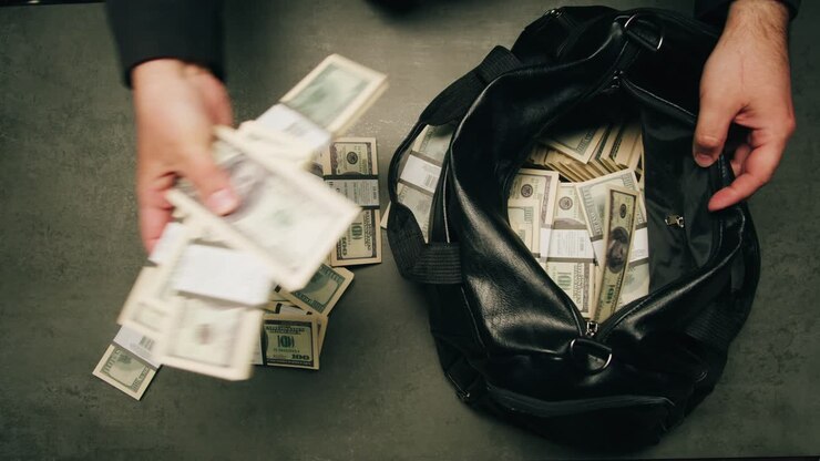 Specialised police officer Counting dollar banknotes in crime lab, conceptual image. High quality 4k footage