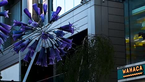 Large-pink-tree-outside-WAHACA,-Stratford,-London,-United-Kingdom