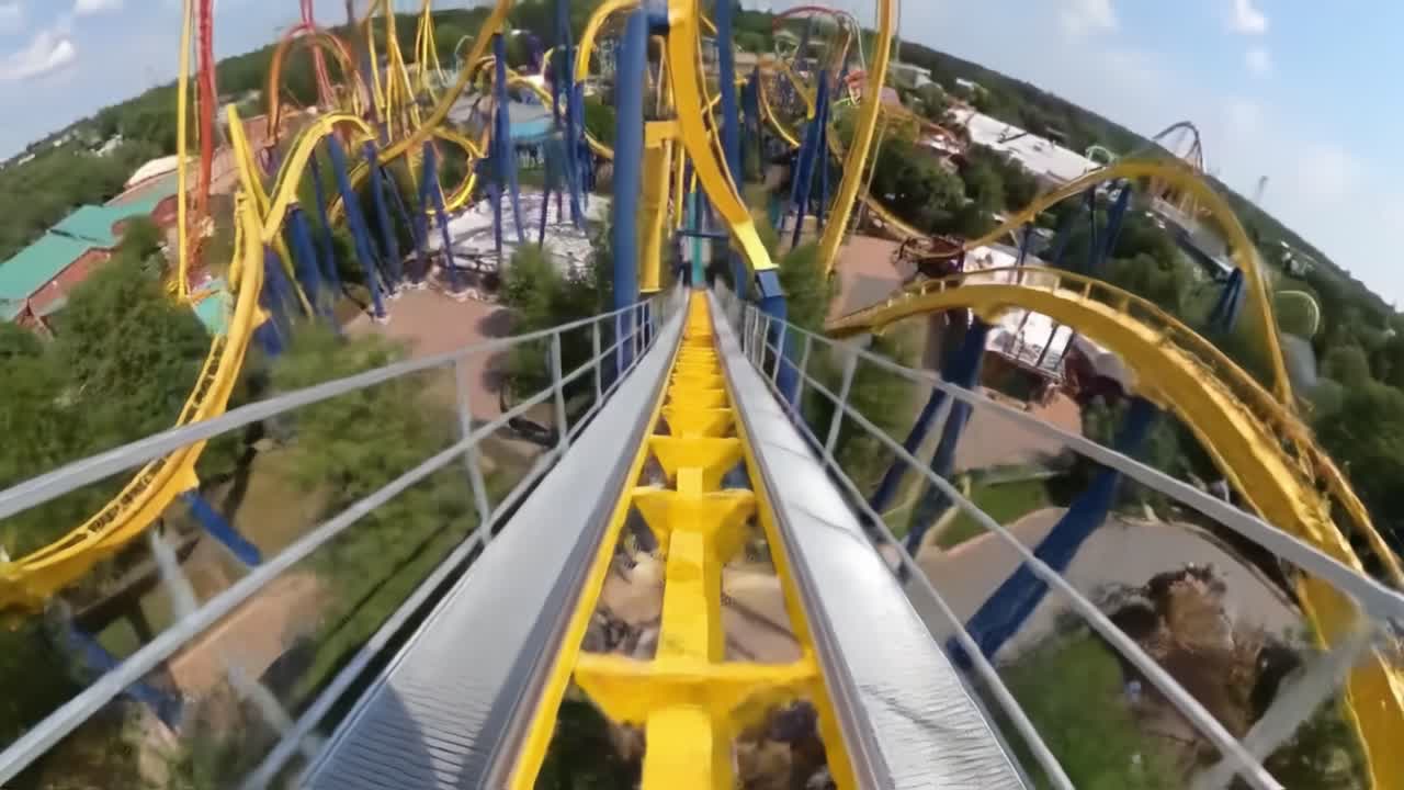 Heart-Pounding Descent: Experience the Thrill of Amusement Park Roller Coaster Adventure in Stunning Perspectives with Daring Drops and Twists