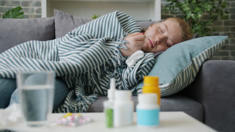 sick woman taking temperature