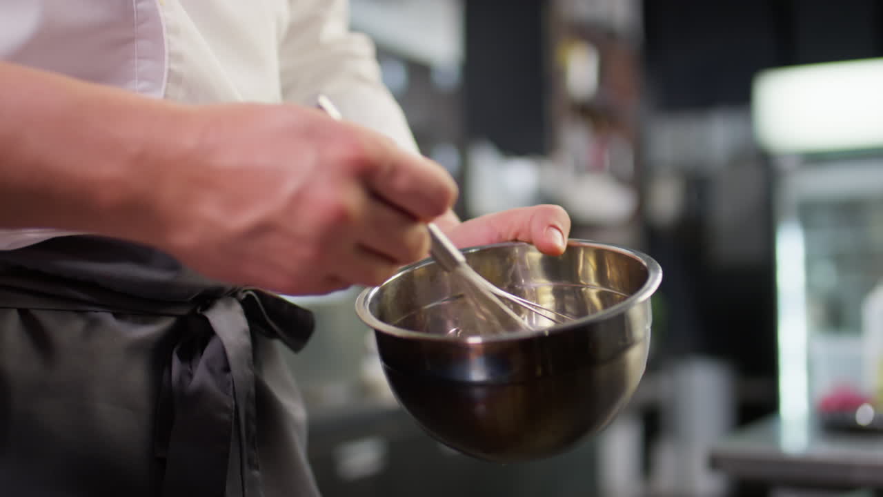 Chef Blending Ingredients with Whisk