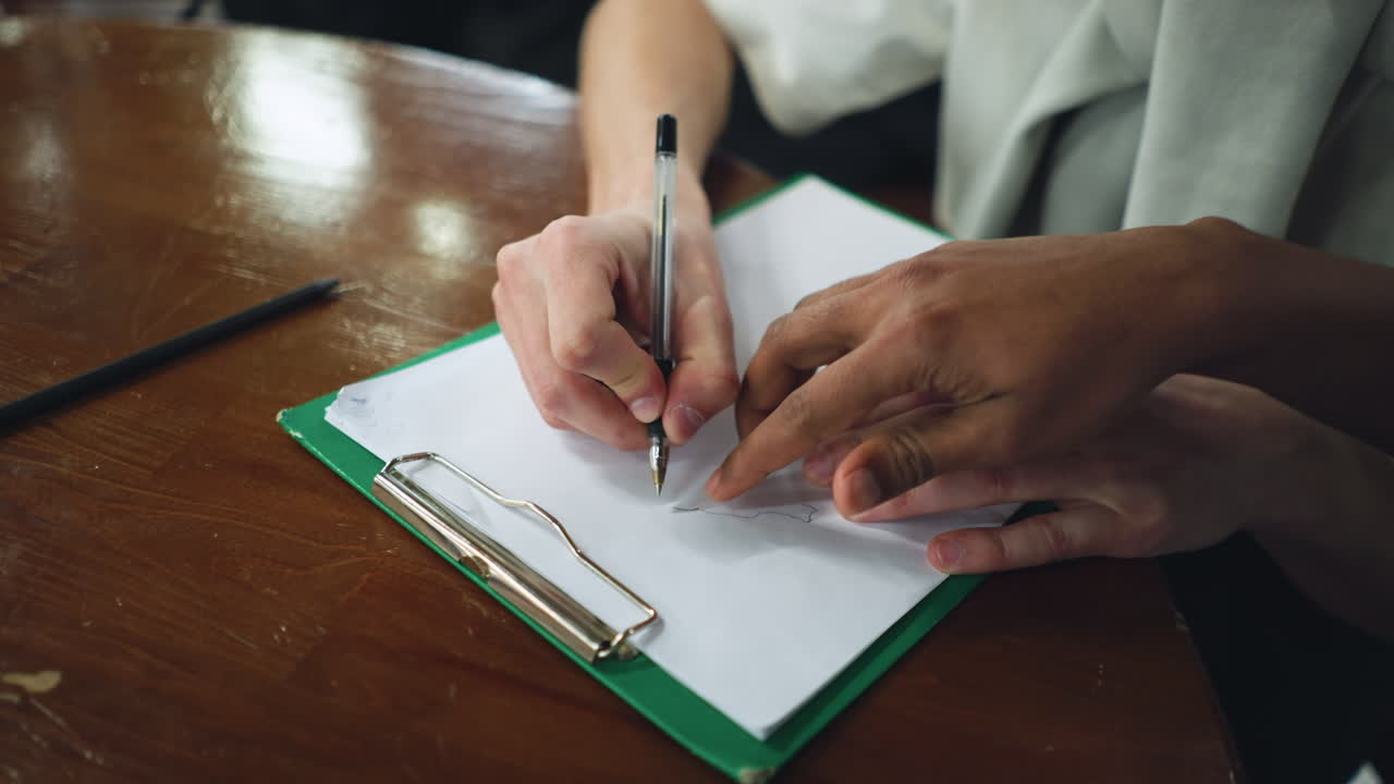Close up pencil sketch on textured white paper under soft natural light, fine shading and contour lines visible in crisp focus, drawing details emphasized to showcase artistic process in progress