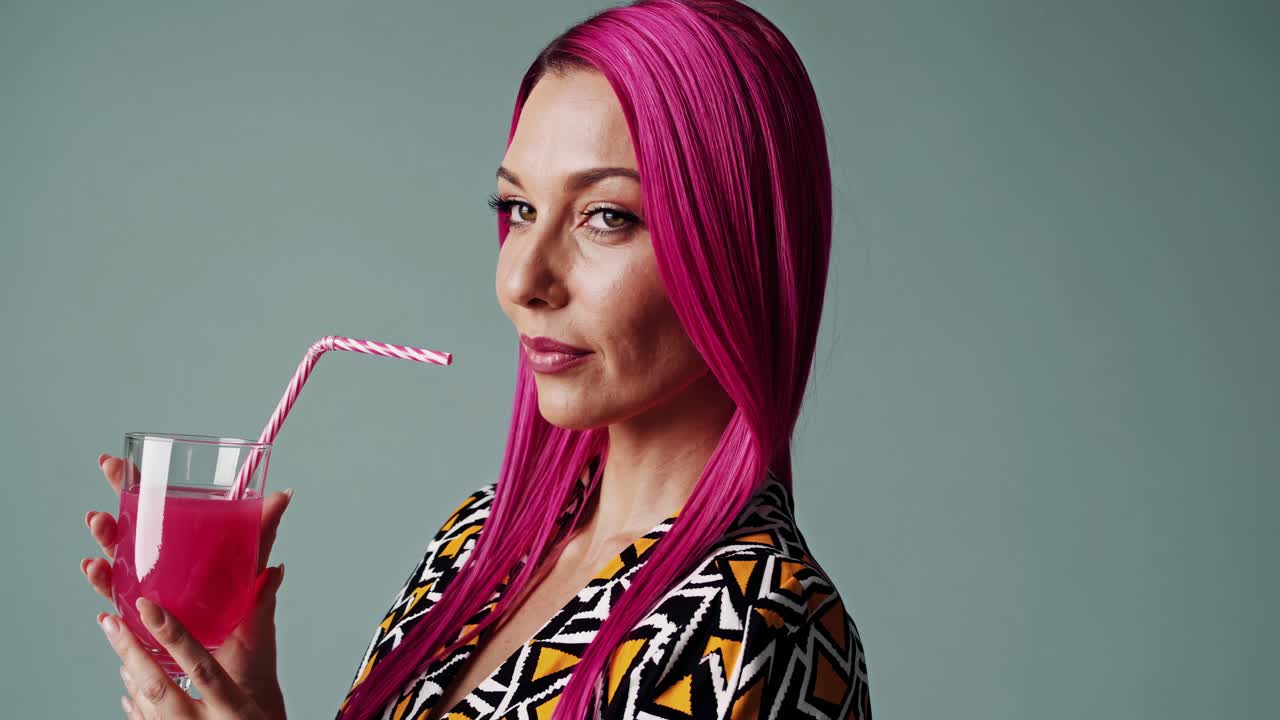 Woman with Pink Hair Drinking Juice