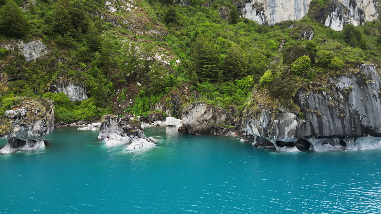 Aerial drone view of the famous marble caves of Patagonia, carved by centuries of water erosion