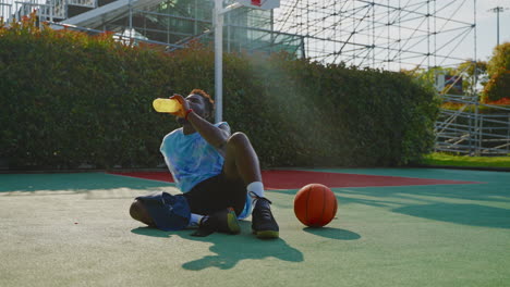 man resting after a basketball game