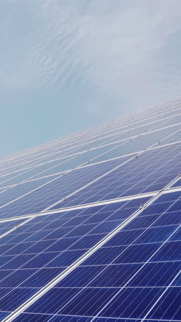 solar battery panel modules with blue sky, vertical video