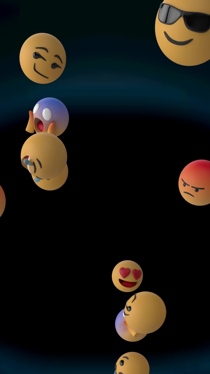 Animace padajících mnoha emoji na tmavém pozadí