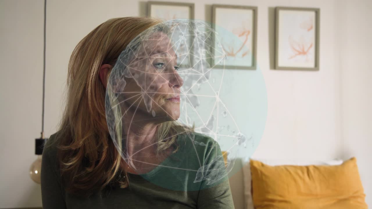 Mature woman on bed holding head then reflecting while globe fading, rotating past face for tech