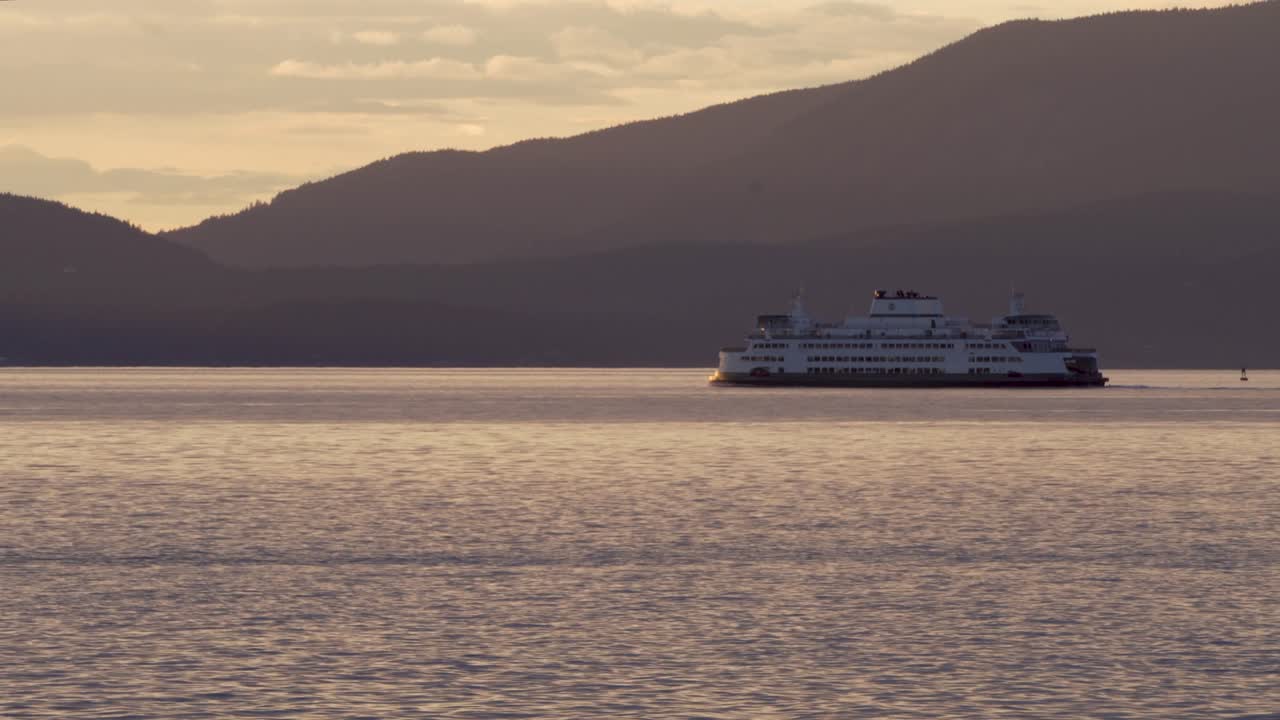 Boat Traveling Near Coast In Washington, USA - Wide shot