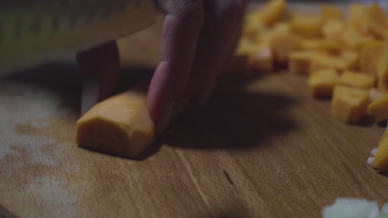 Women's hands wash, peel and cut vegetables into vegetable stew