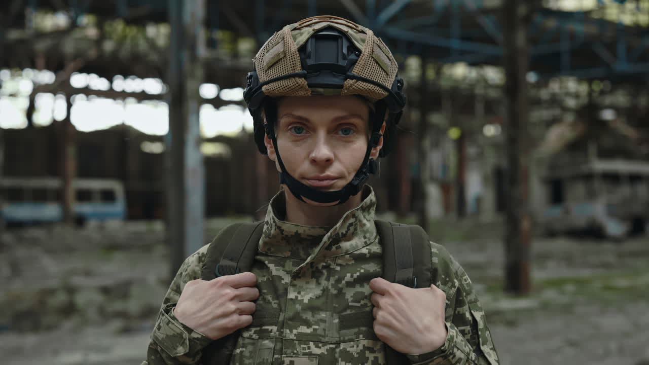 Female Soldier in a Damaged Building