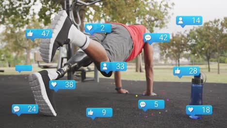 Animation-of-social-media-icons-with-numbers,-african-american-man-with-prosthetic-leg-doing-plank