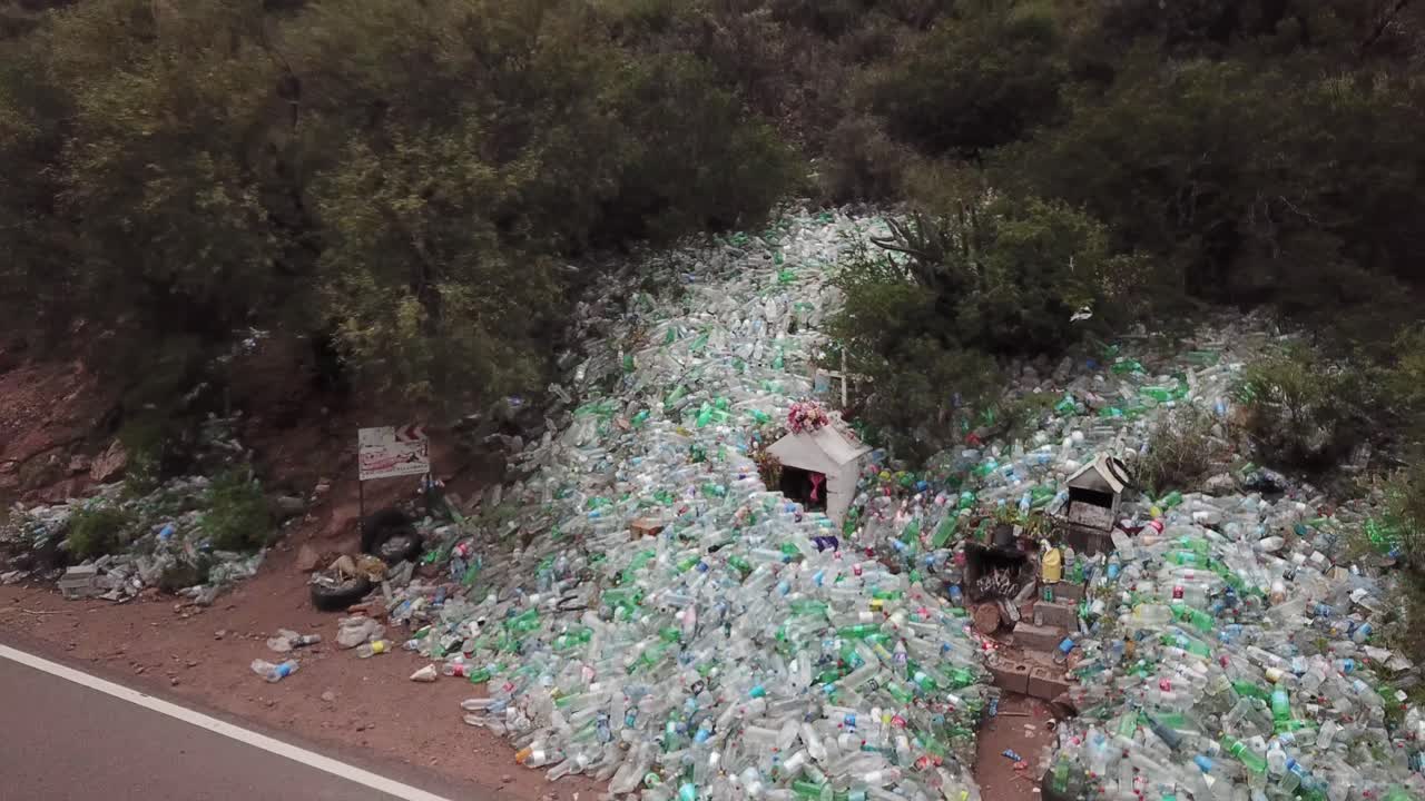 Aerial View of Plastic Bottles Waste By Road and Difunta Correa Modern Saint Shrine, Argentina