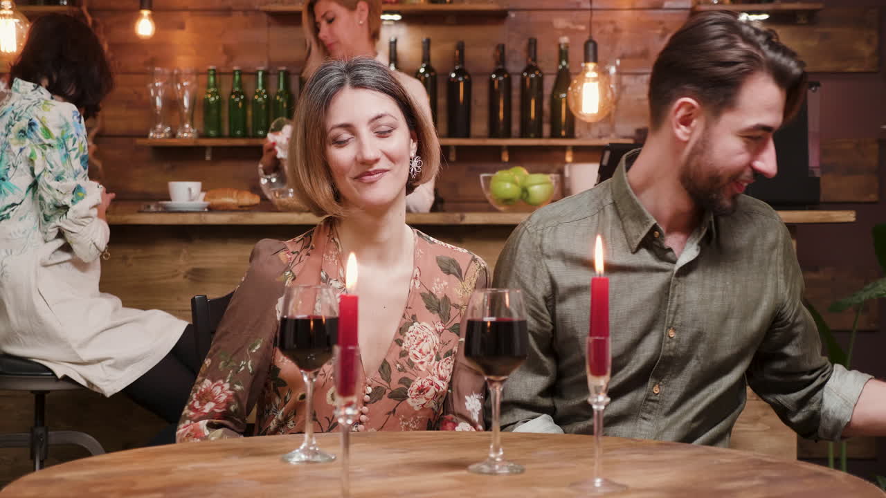 Romantic dinner date with wine and gift