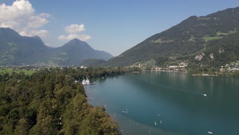 aerial view of beautiful lakes in europe along with water sports and fishing boats