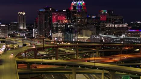 aerial view of city highway interchange at night