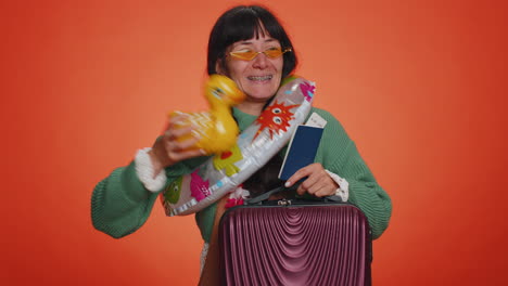 traveler tourist young woman celebrating, holding passport tickets, luggage, vacation, journey, trip