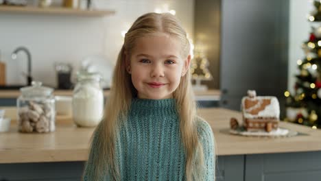 portrait video of little girl in the kitchen