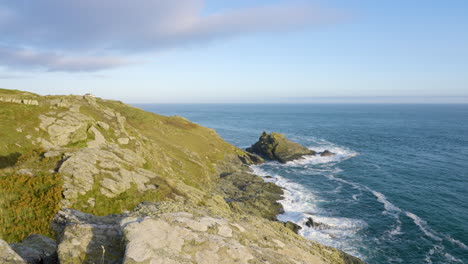 coastal view with rocky cliffs and waves