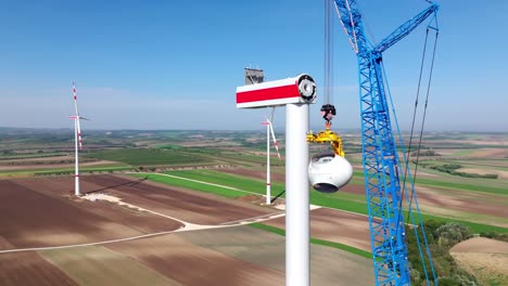 wind turbine engine under construction - aerial drone shot