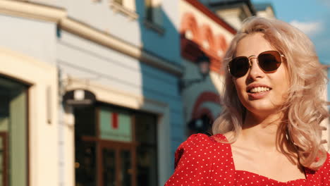 woman in a red dress in a city