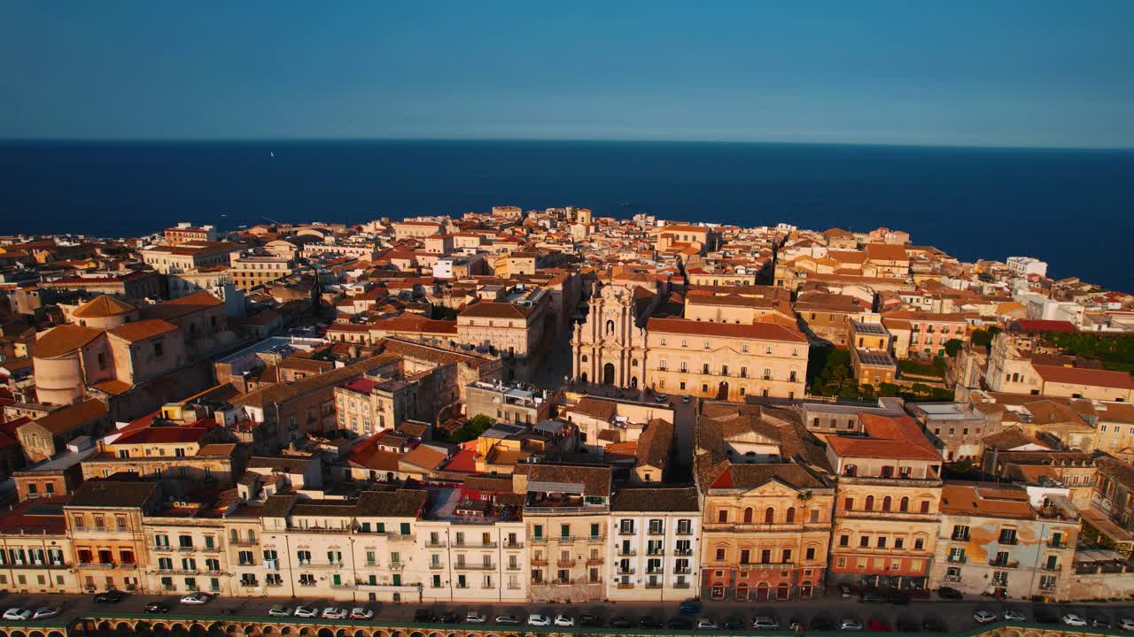 Sunset shadows at ancient Ortigia old town, Syracuse, Sicily, Italy. Historic center, streets, buildings.