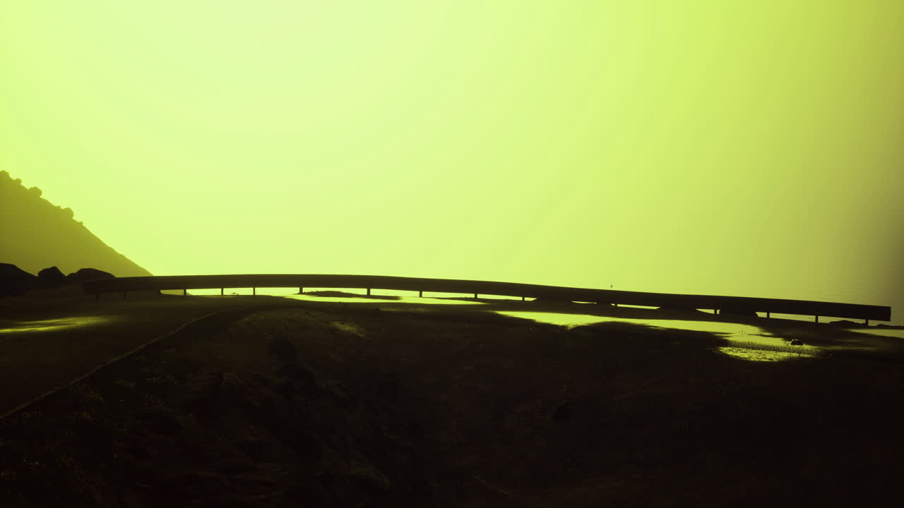 Unique bridge structure at dusk with vibrant ambient light effects