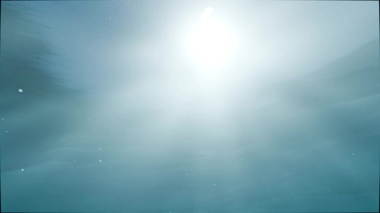 Shifting sunlight through surface ripples, forming pulsing shafts in water with drifting particles
