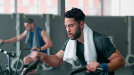 Exercise-bike,-fitness-or-towel-with-a-man-athlete