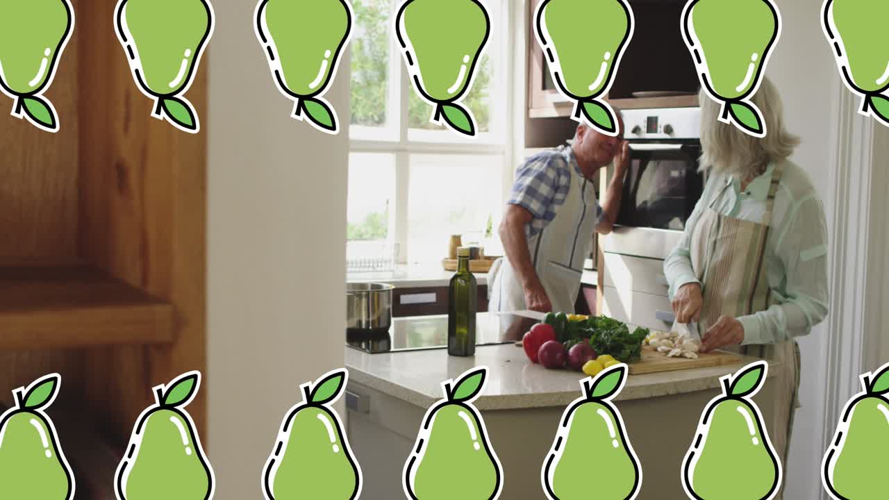 Animation of pear icons over senior caucasian couple cooking
