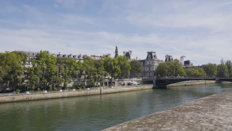 Pont D&#039;Arcole Bridge Crossing River Seine In Paris France With Tourists