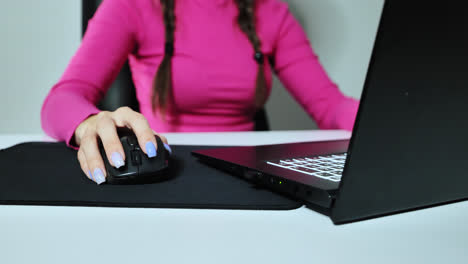 remote work lifestyle in home office showing minimal design, focused female user
