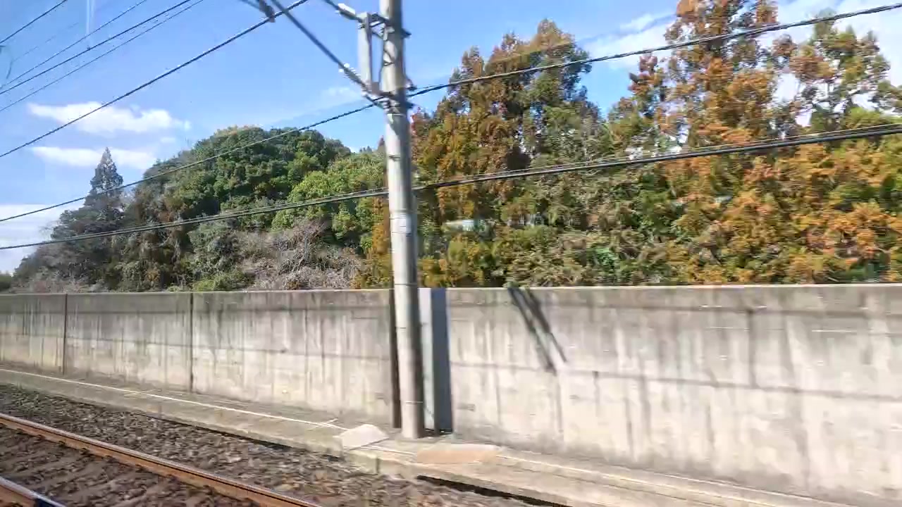View of Japanese Countryside from Moving Train Window