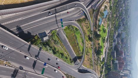 aerial view of highway roads beside bicentenario park in santiago, chile