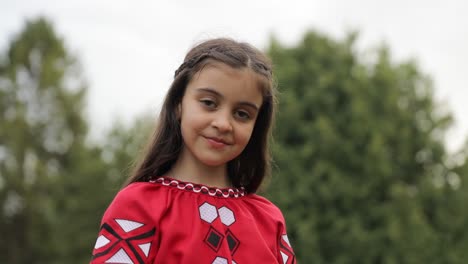 shooting of happy little girl walking through field gorgeous ukrainian beauty spectacular view smile shooting of happy little girl walking through field gorgeous ukrainian beauty spectacular view smile outdoors good mood