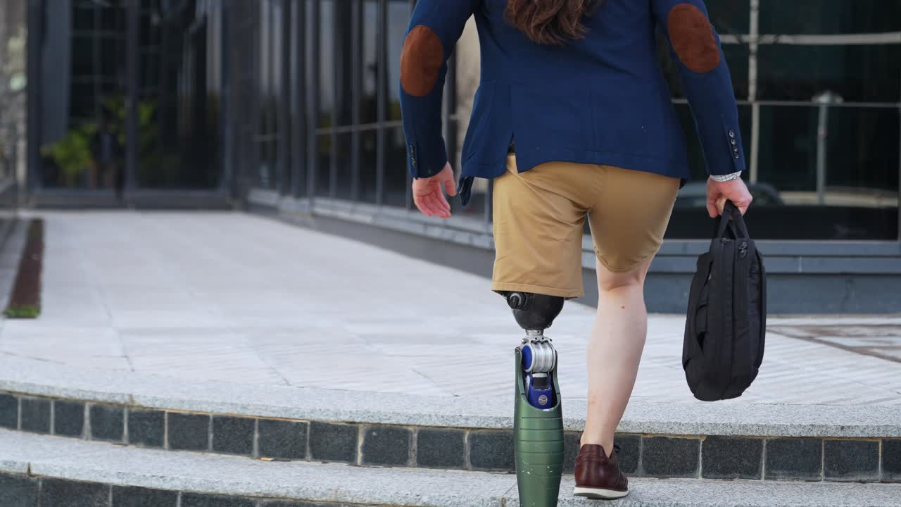Professional Amputee Walking Outside Office Building