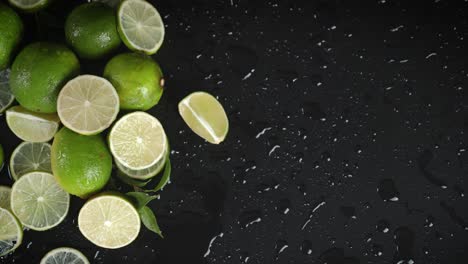 pieces of fresh sour lime slowly rotating.