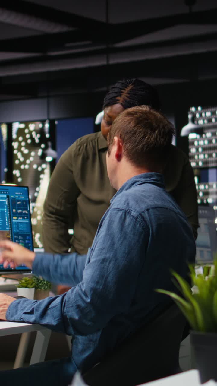 Vertical Video Diverse team of engineers using artificial intelligence to design a floor plan