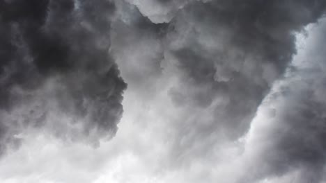 view of heavy storm at dark clouds